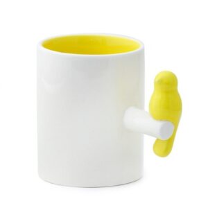 Taza de cerámica con pájaro color amarillo